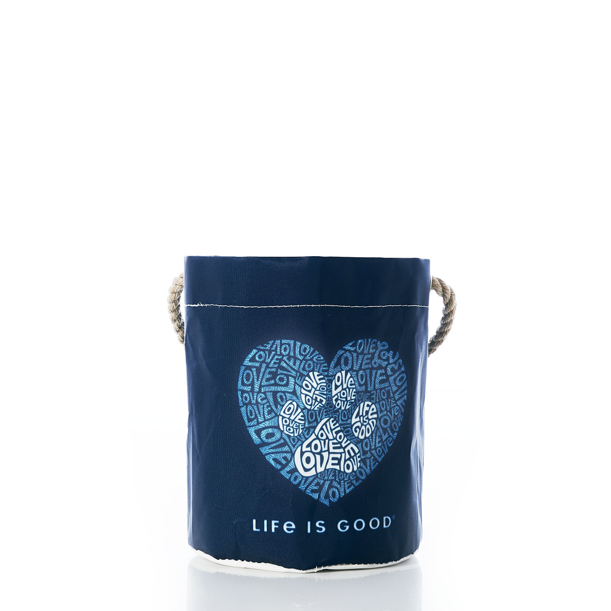 white paw print made of words inside light blue heart print made of words on navy recycled sail cloth bucket with hemp rope handle
