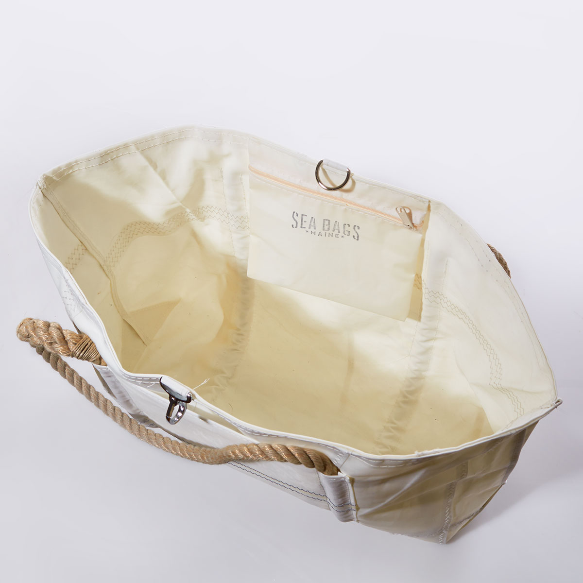interior view of white recycled sail cloth tote with hemp rope handles