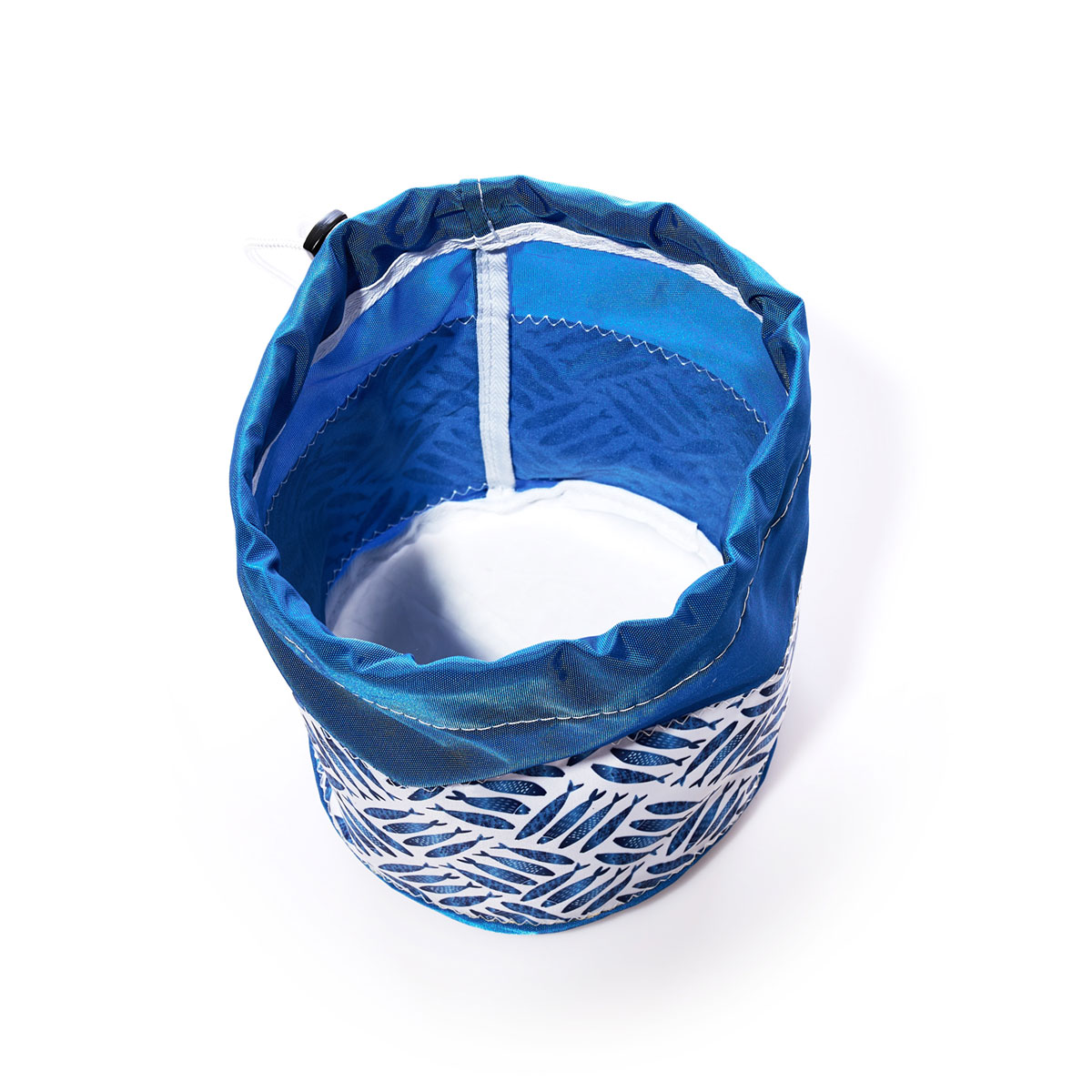 criss cross print of blue school of fish on recycled sail cloth ditty bag with drawstring
