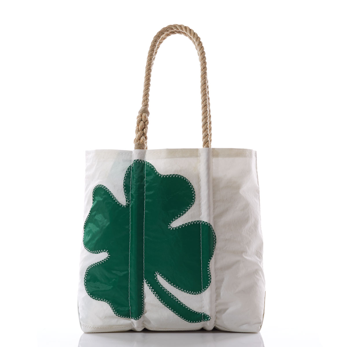 green four leaf clover applique on a white recycled sail cloth tote with hemp rope handles