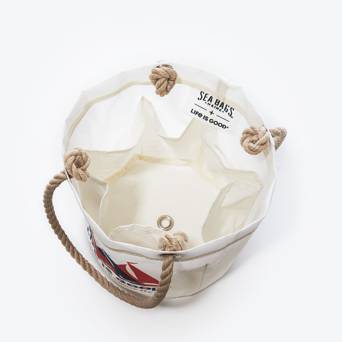 inside view of four sailboats in patriotic red and blue printed on white recycled sail cloth beverage bucket with hemp rope handles