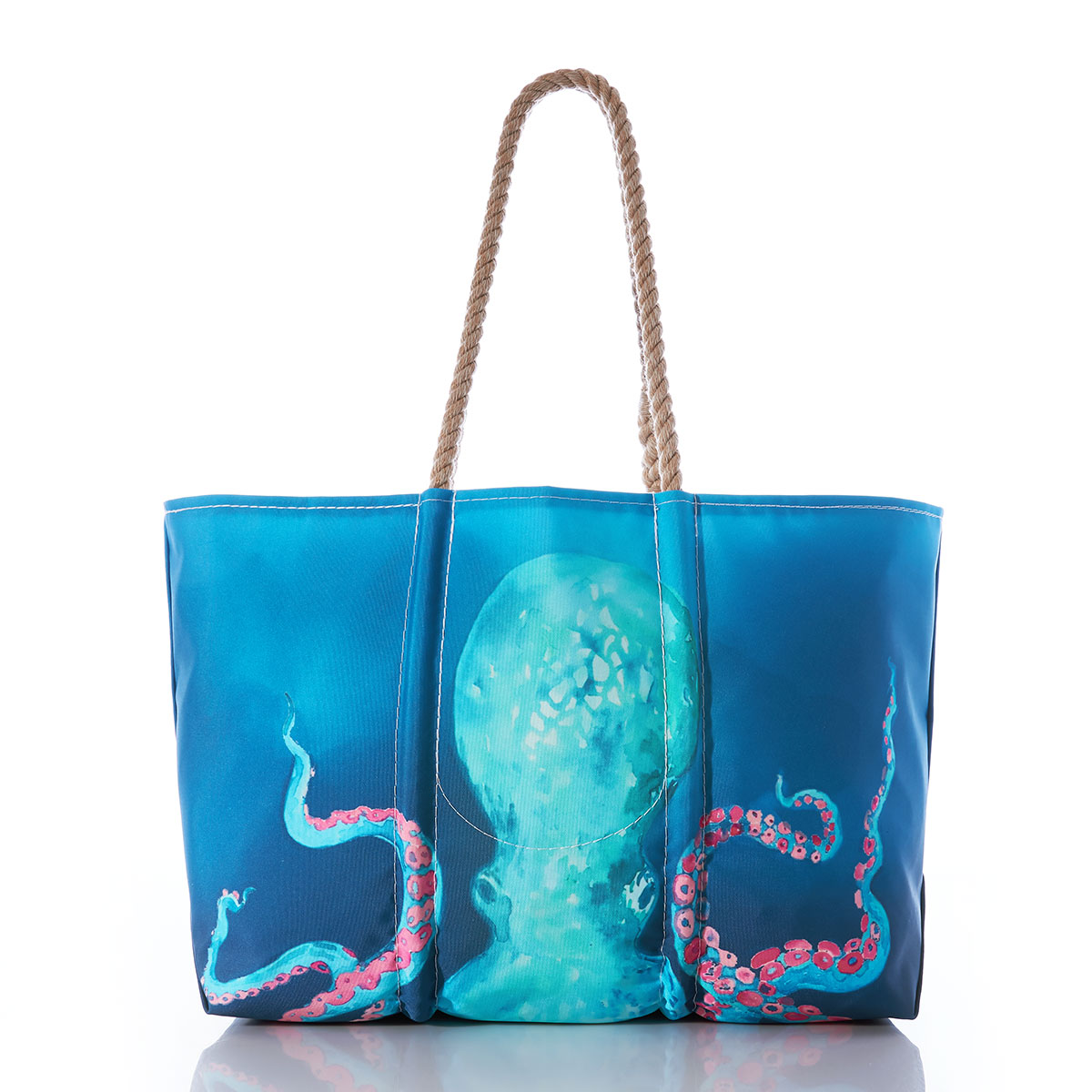 back view of the head of a colorful bioluminescent octopus in blue with pink tentacles stretches its legs up the the top of a blue recycled sail cloth tote with hemp handles