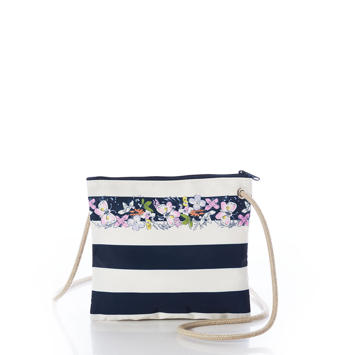 bold navy and white striped recycled sail cloth crossbody bag with hemp rope embellished with flowers around the top
