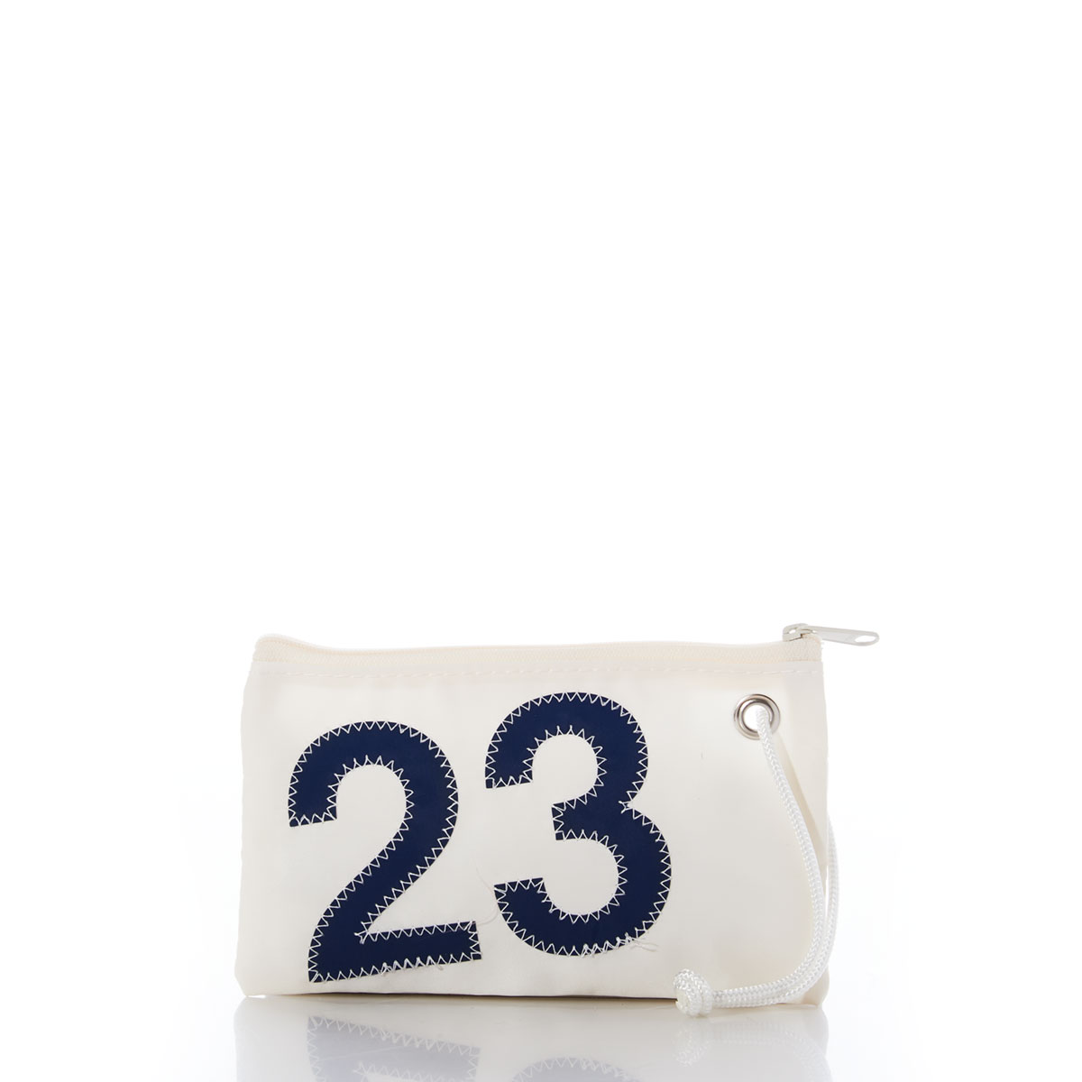a white recycled sail cloth wristlet is adorned with a navy applique number 23 and finished with a white zipper and strap through a grommet