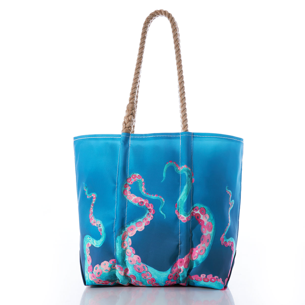 a colorful bioluminescent octopus in blue with pink tentacles stretches its legs up the the top of a blue recycled sail cloth tote with hemp handles