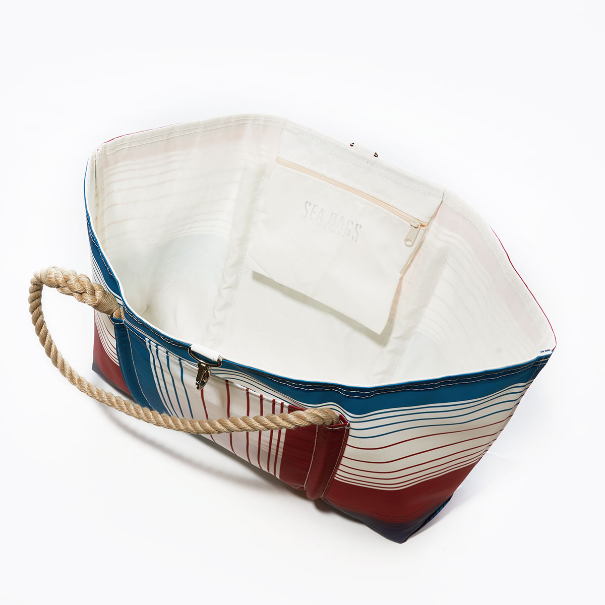 inside view of patriotic plaid stripes in red white and blue printed on recycled sail cloth large pier tote with hemp rope handles