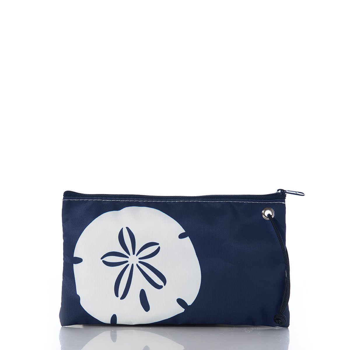 a navy recycled sail cloth wristlet with a rope string is embellished with a white sand dollar