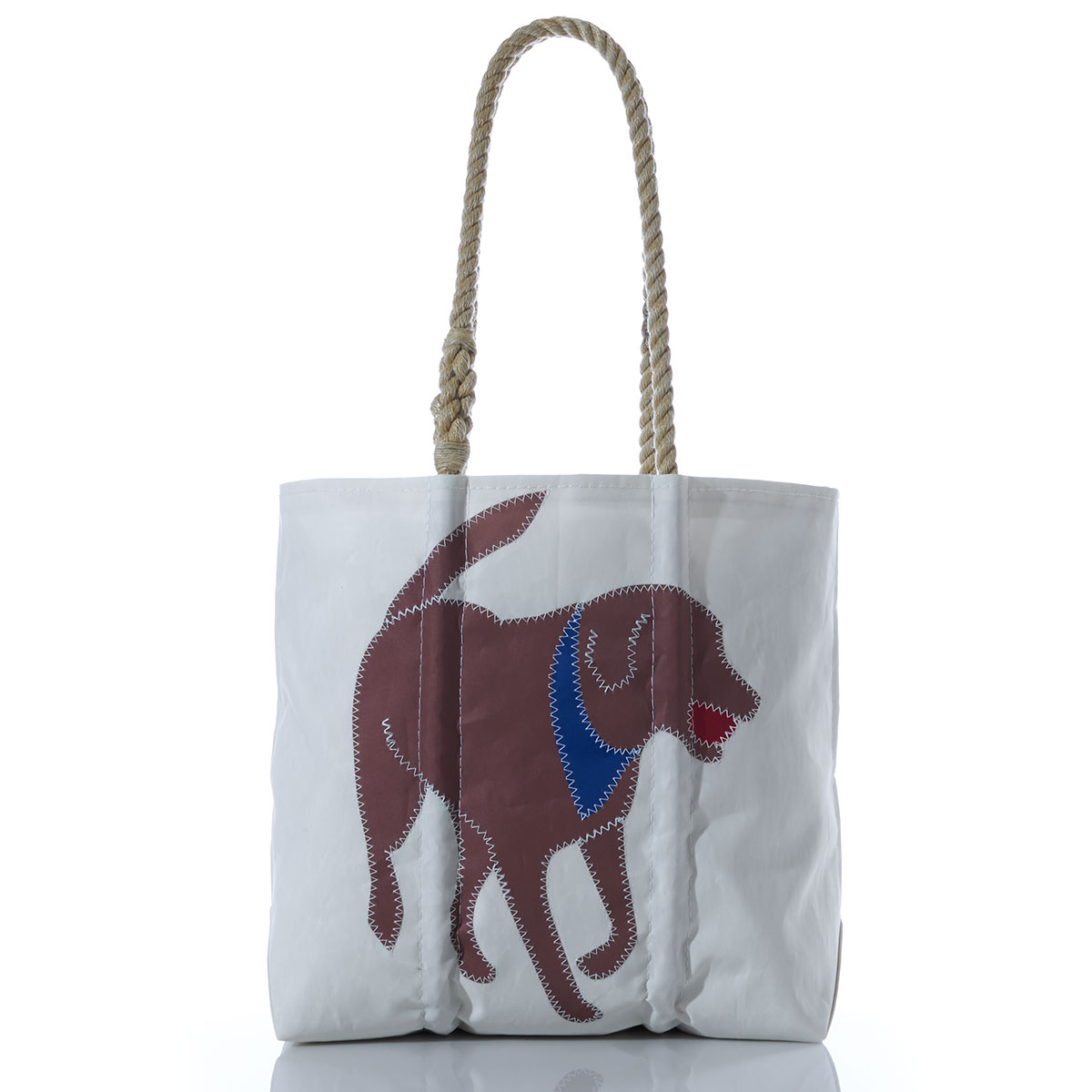 brown chocolate lab applique with a blue bandana and red ball in his mouth on the front of a recycled sail cloth tote with hemp rope handles