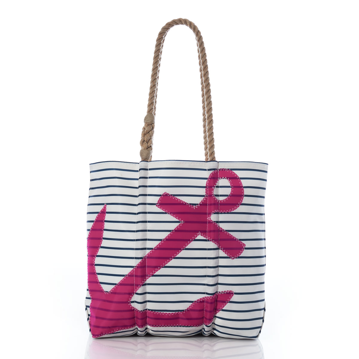 a recycled sail cloth tote with hemp rope handles is printed with navy and white stripes and a pink anchor 