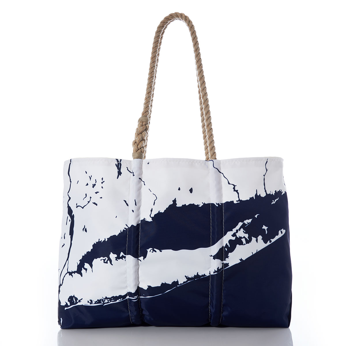 a recycled sail cloth tote with hemp handles is printed with a navy ocean next to a white coastline of Long Island