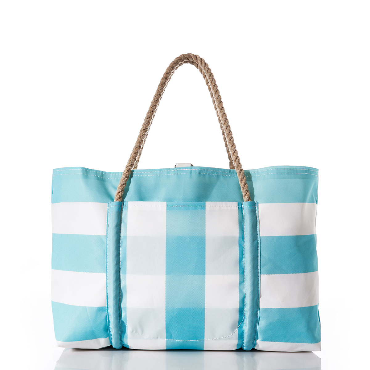 back view: aquamarine and white plaid stripes adorn the front of a recycled sail cloth tote with hemp rope handles and a top metal clasp