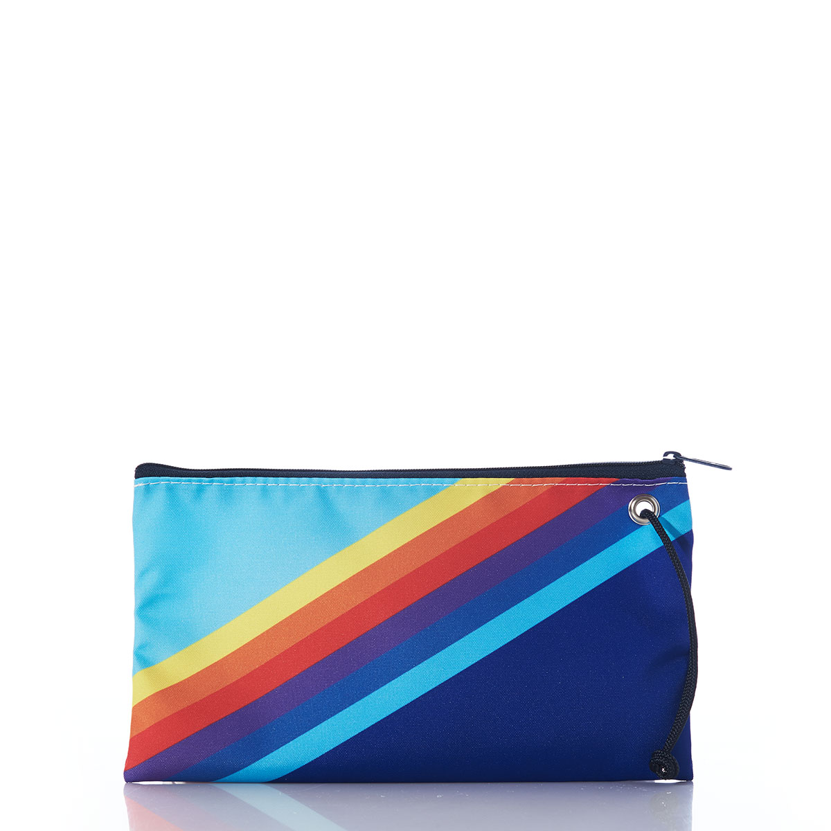 front view of a large wristlet is printed with retro stripes that range from light blue in the top left corner to dark blue in the bottom right corner, with rainbow colored stripes in between