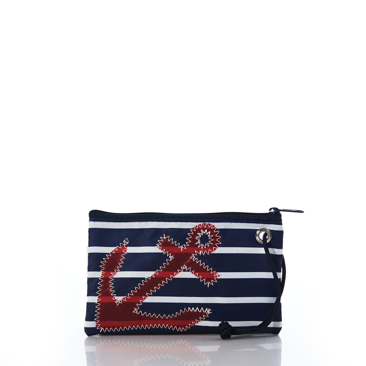red anchor applique on navy and white stripes printed on recycled sail cloth wristlet with navy zipper and wristlet strap