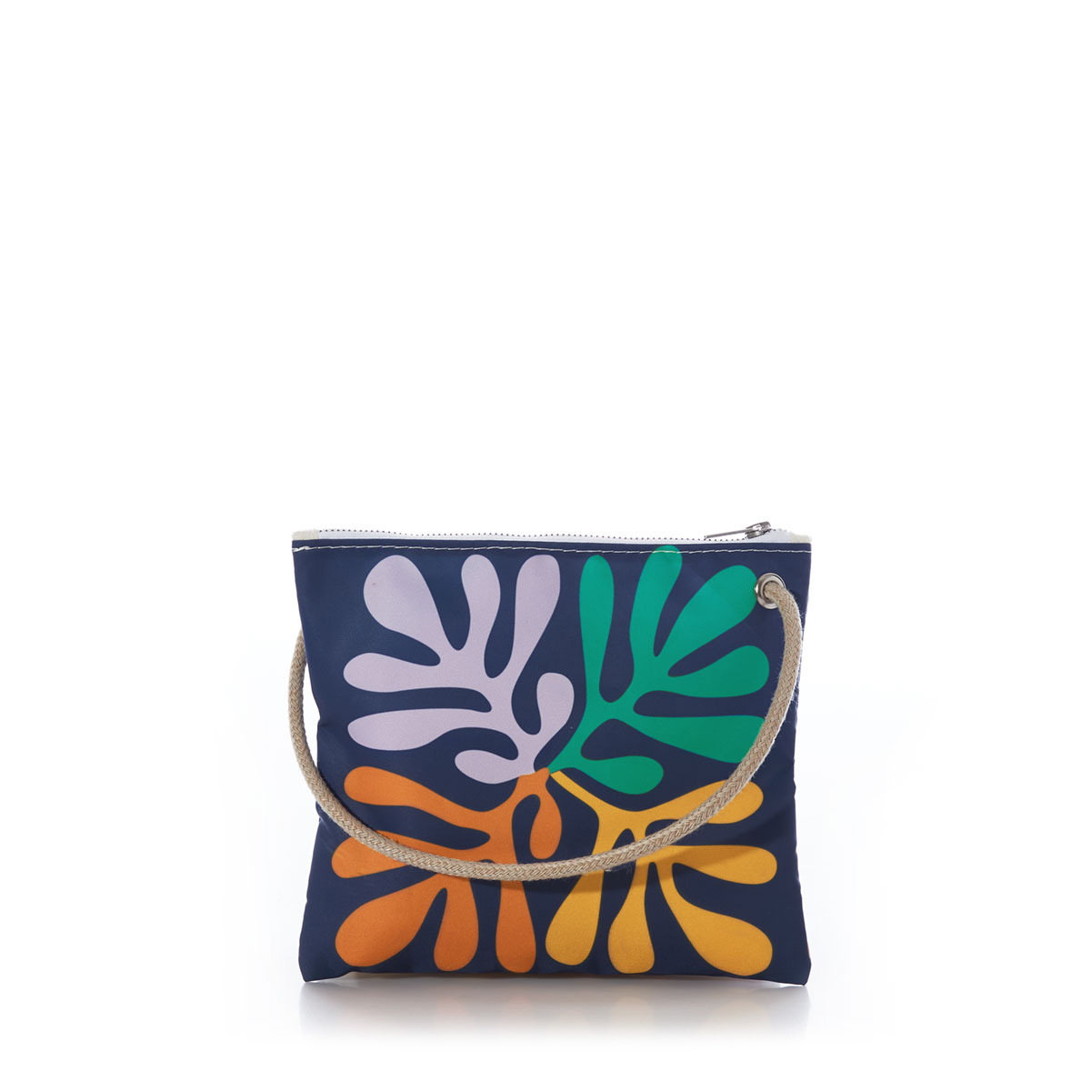back side of a navy sail cloth crossbody bag with long hemp rope handle is printed with a pattern of four blocks of four different colors of a strand of seaweed floral design