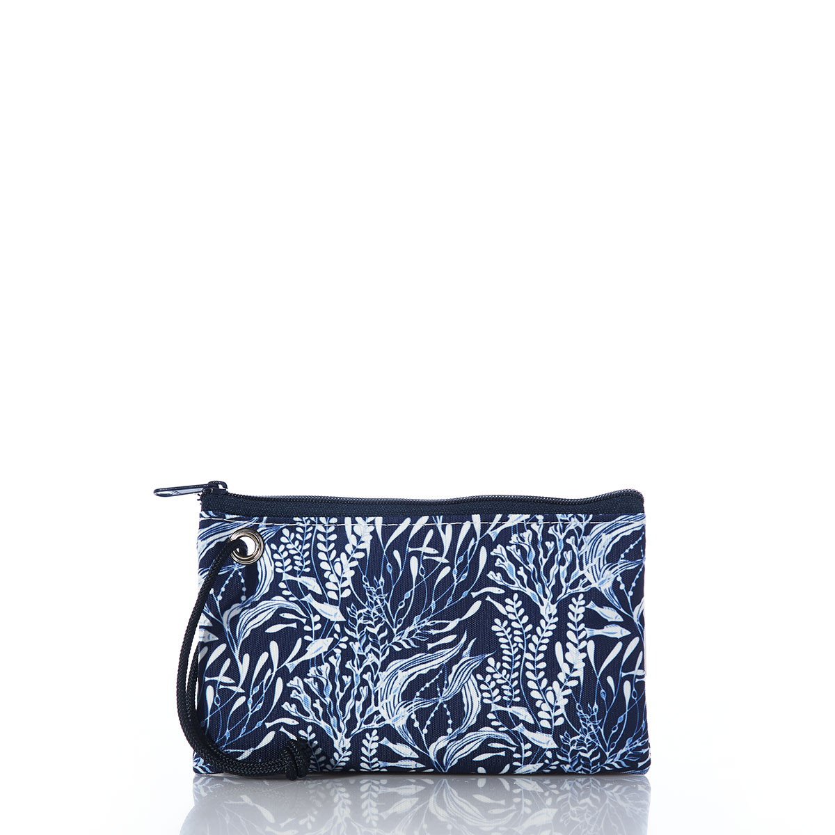 little fish swim among various types of seaweed in shades of navy and white on a recycled sail cloth wristlet, back view
