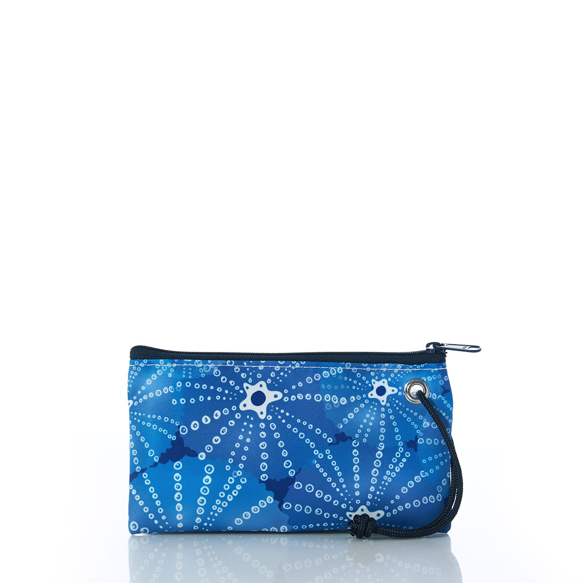 blue sea urchins in an all over print on recycled sail cloth wristlet with navy zipper and wristlet strap