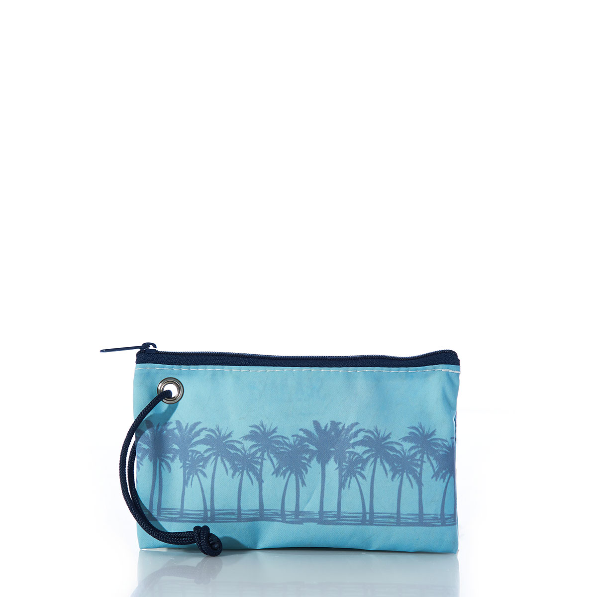 back view of a row of palm trees in front of a rising sun printed on a blue recycled sail cloth wristlet with navy zipper and wristlet strap